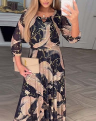 Elegantna šifonska haljina sa cvetnim uzorkom i rukavima do tri četvrtine