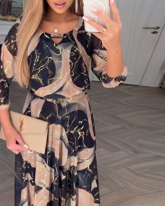 Elegantna šifonska haljina sa cvetnim uzorkom i rukavima do tri četvrtine